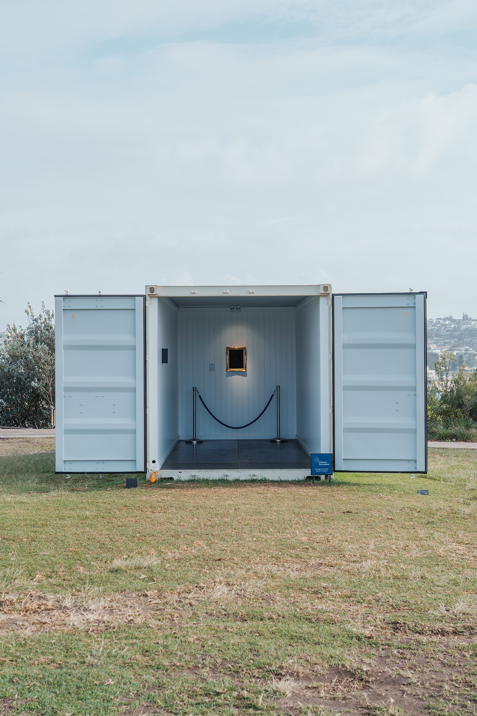 The open shipping-container gallery and its surroundings.